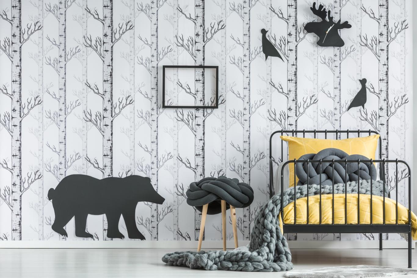 Shadow decals of animals on a decorative wall. 