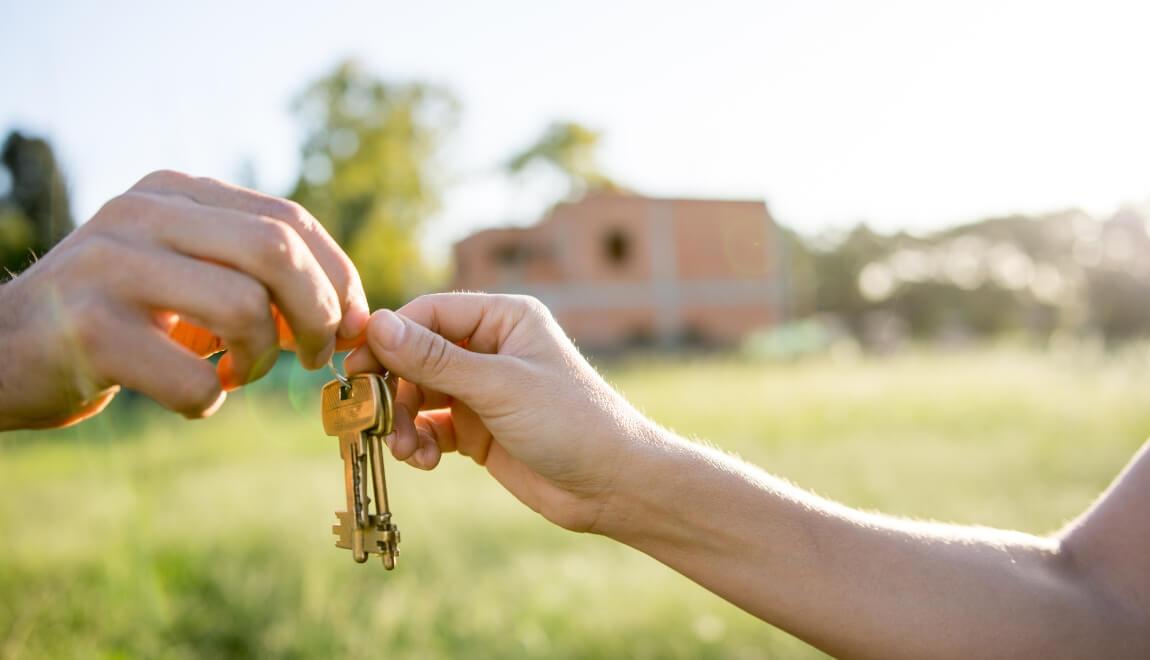 Handing over keys to a rental.