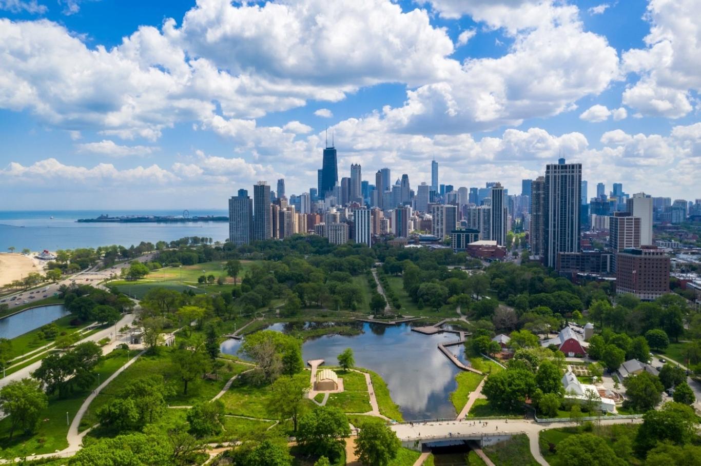 Aerial view of Lincoln Park with the Chicago skyline in the background.
