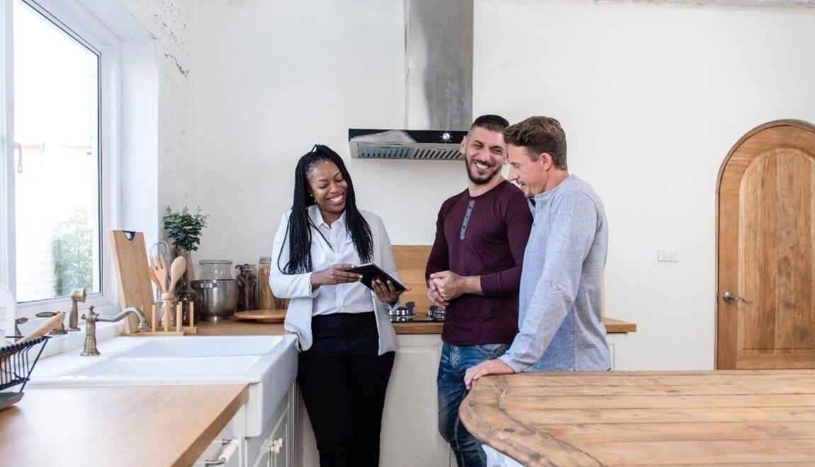 Friends talking in the kitchen 