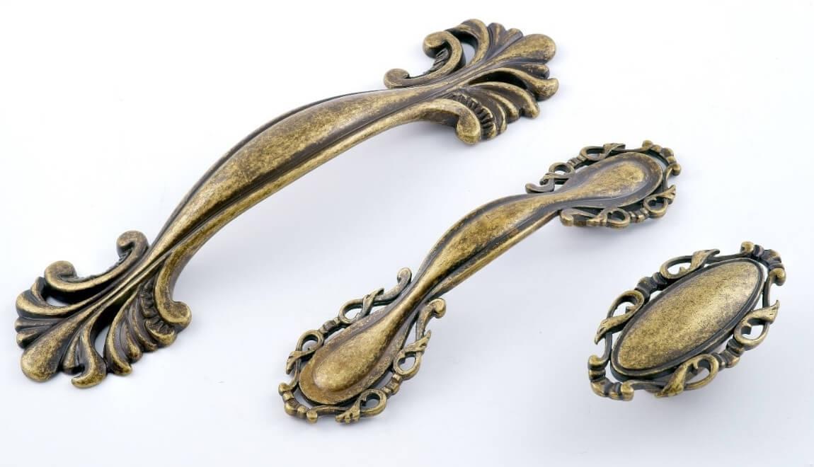 Antique cabinet handles in a variety of styles.