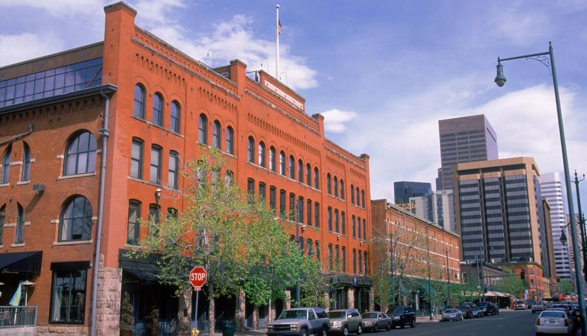 Buildings lining the street in Downtown Denver, Colorado.