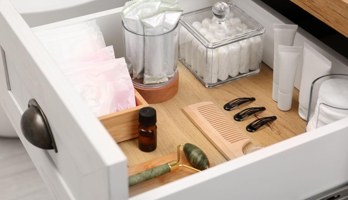 Bathroom drawer shows neat and tidy organization. 