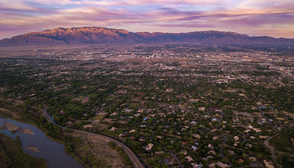 Arial view of Albuquerque, New Mexico and the Sandia Mountains in the sunset