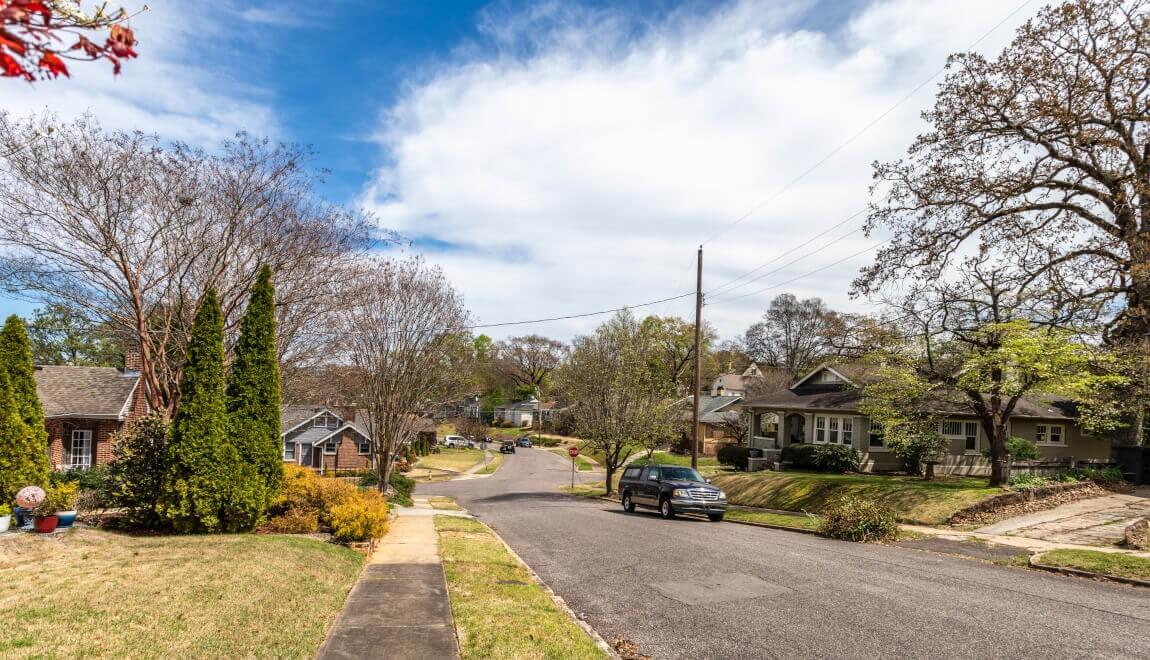 Quaint houses sit along a quiet suburban street in Birmingham, Alabama.