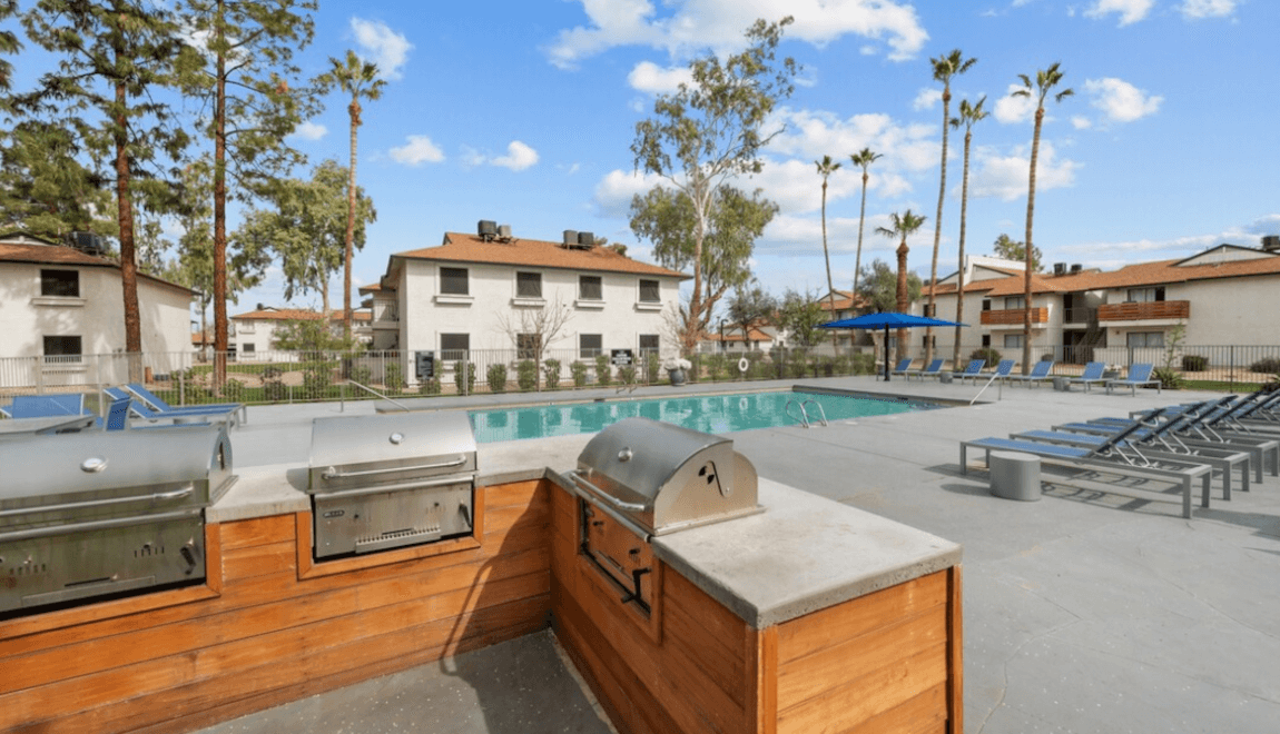 The grill and pool area at the Tides on McDowell apartment complex