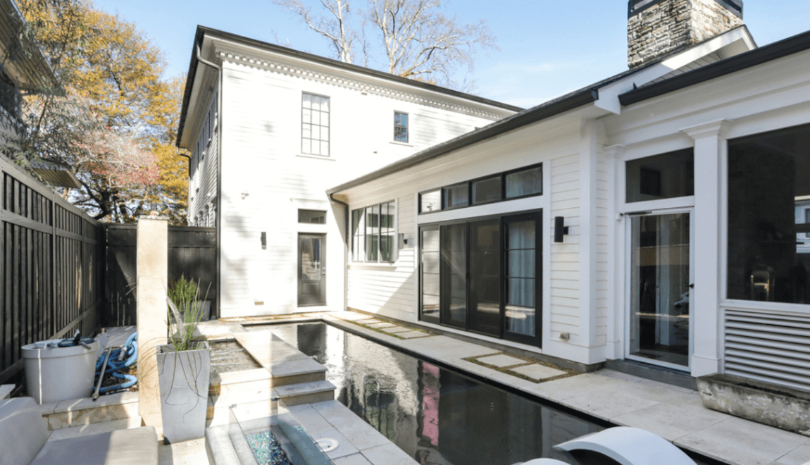 The pool deck of 1013 Euclid Ave NE offers space for al fresco dining.
