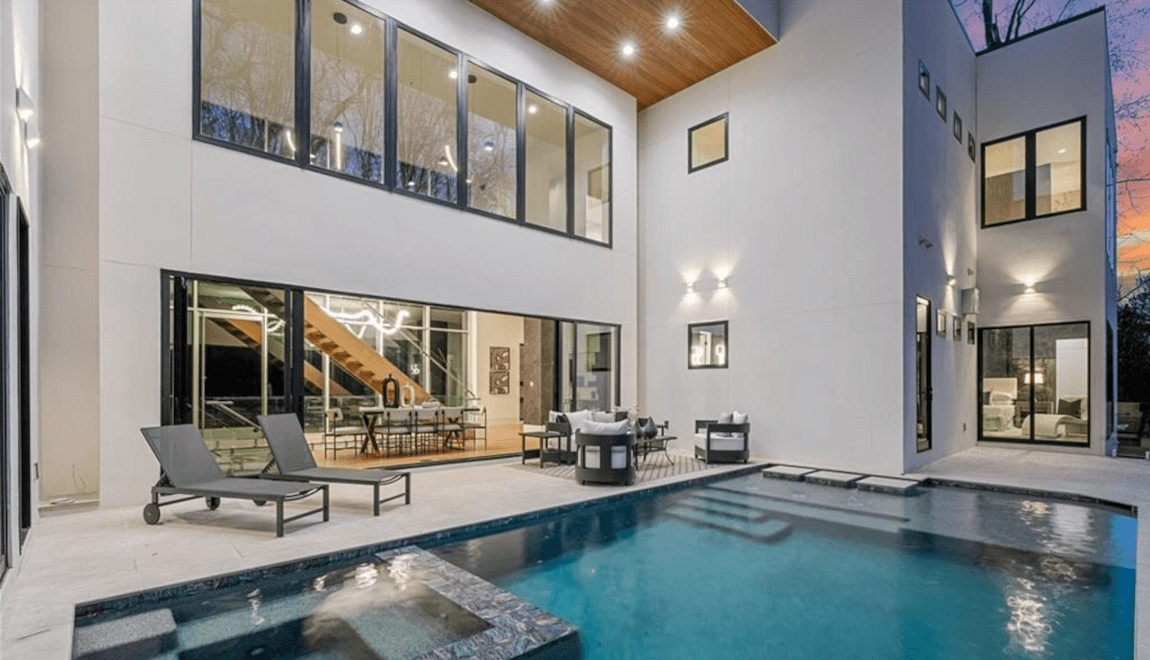 A heated pool and spa on the back patio provide a haven of relaxation.