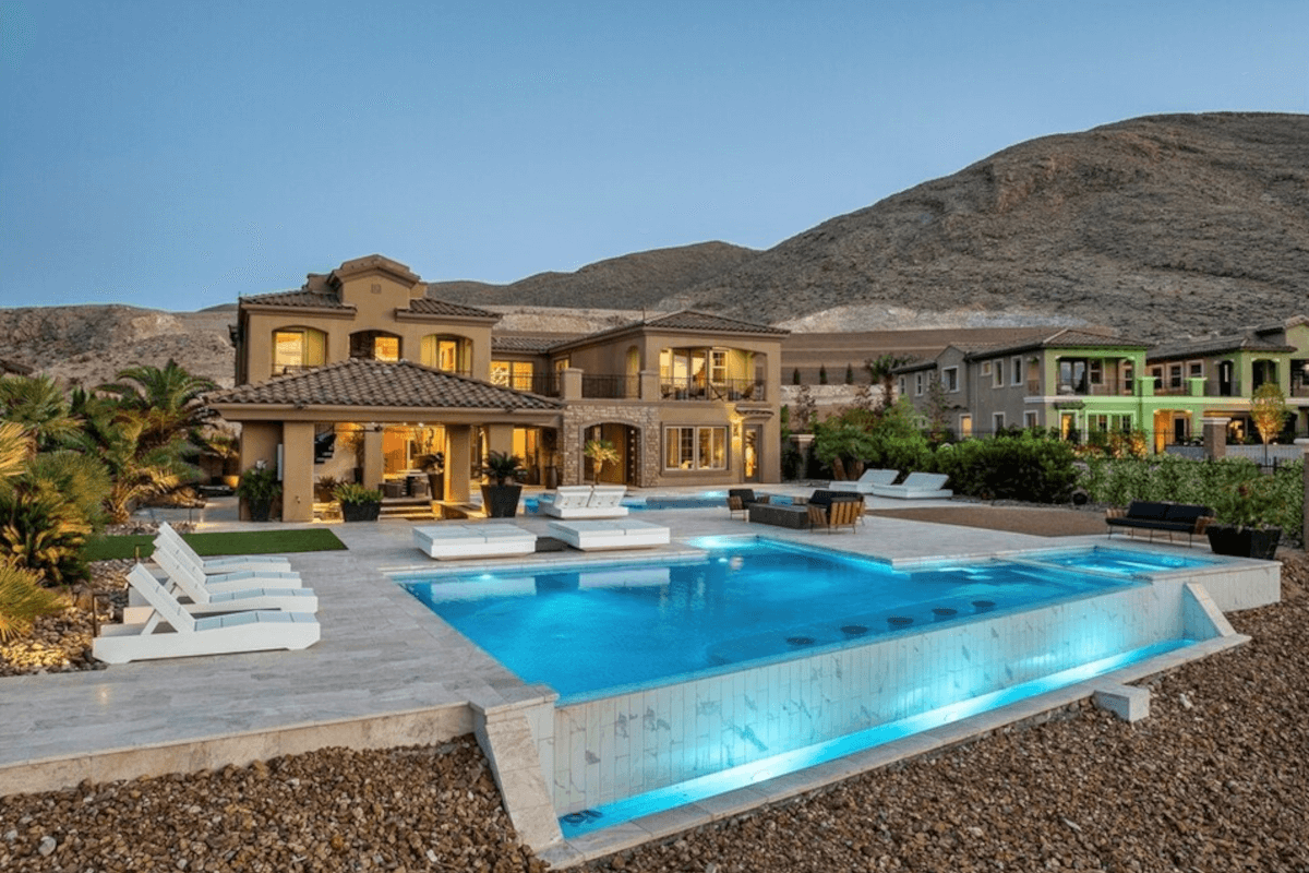 36 Olympia Ridge Drive is a Spanish-style villa with an infinity pool.