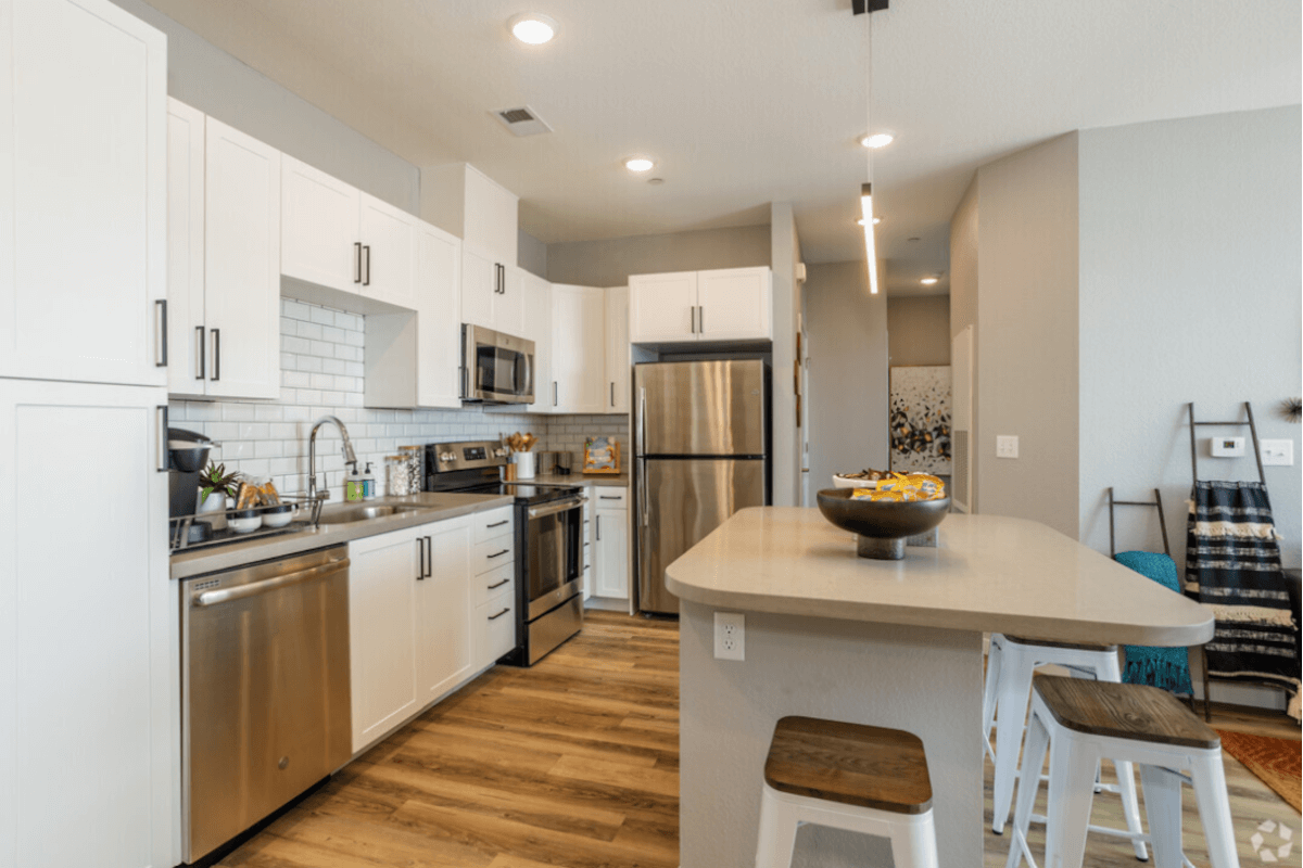 Academy 65 in East Sacramento offers apartments with modern kitchens with stainless steel appliances.