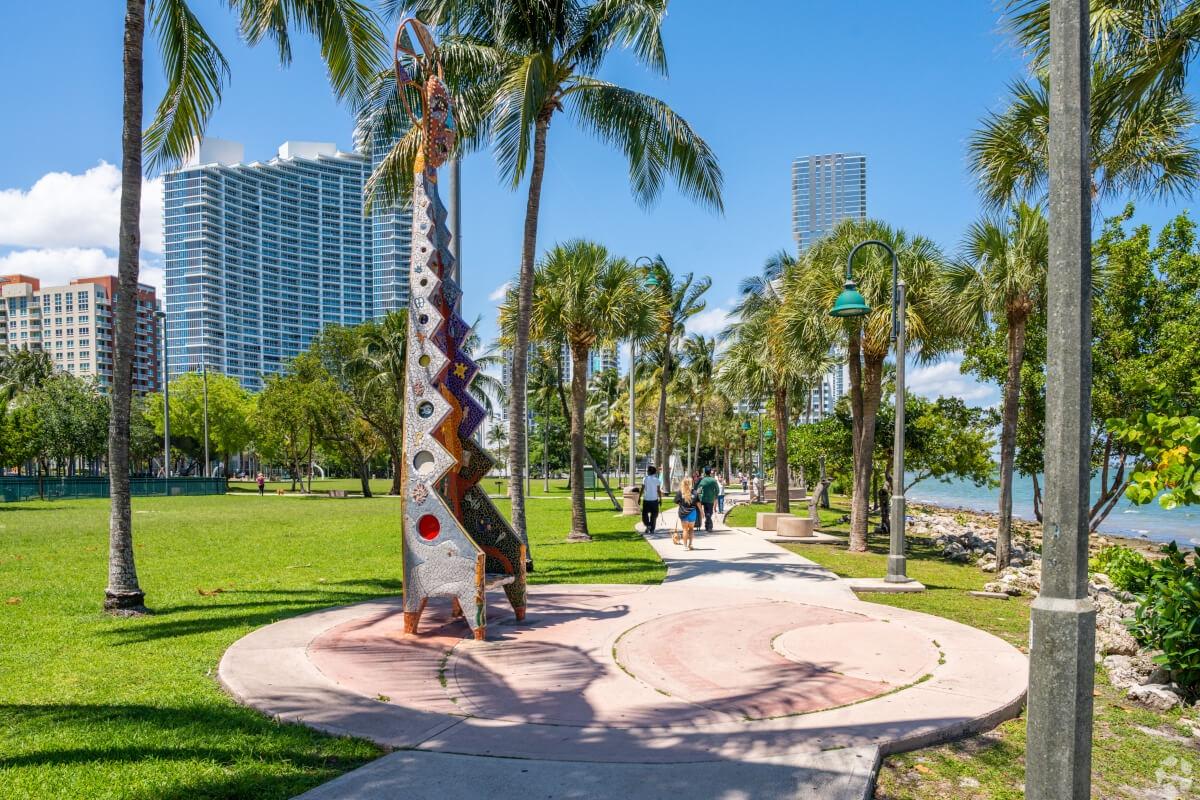 An abstract chair sits in the middle of a walking path along Biscayne Bay in the Edgwater neighborhood.