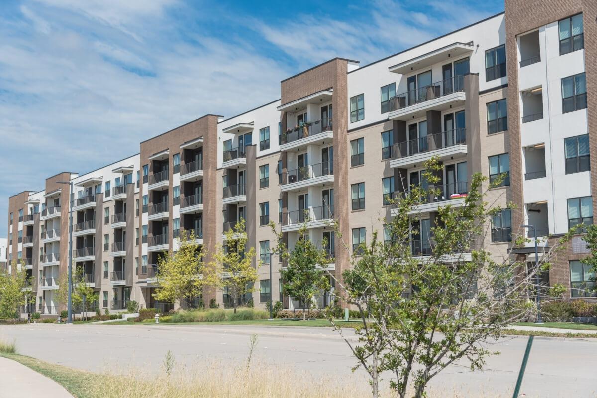 A large apartment complex has balconies in each unit.