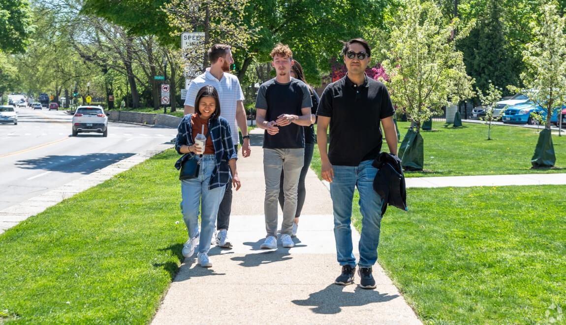 Pedestrians walk in Evanston, IL