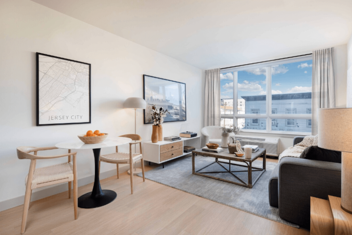 A large window in a unit at Birch House lets in natural sunlight.