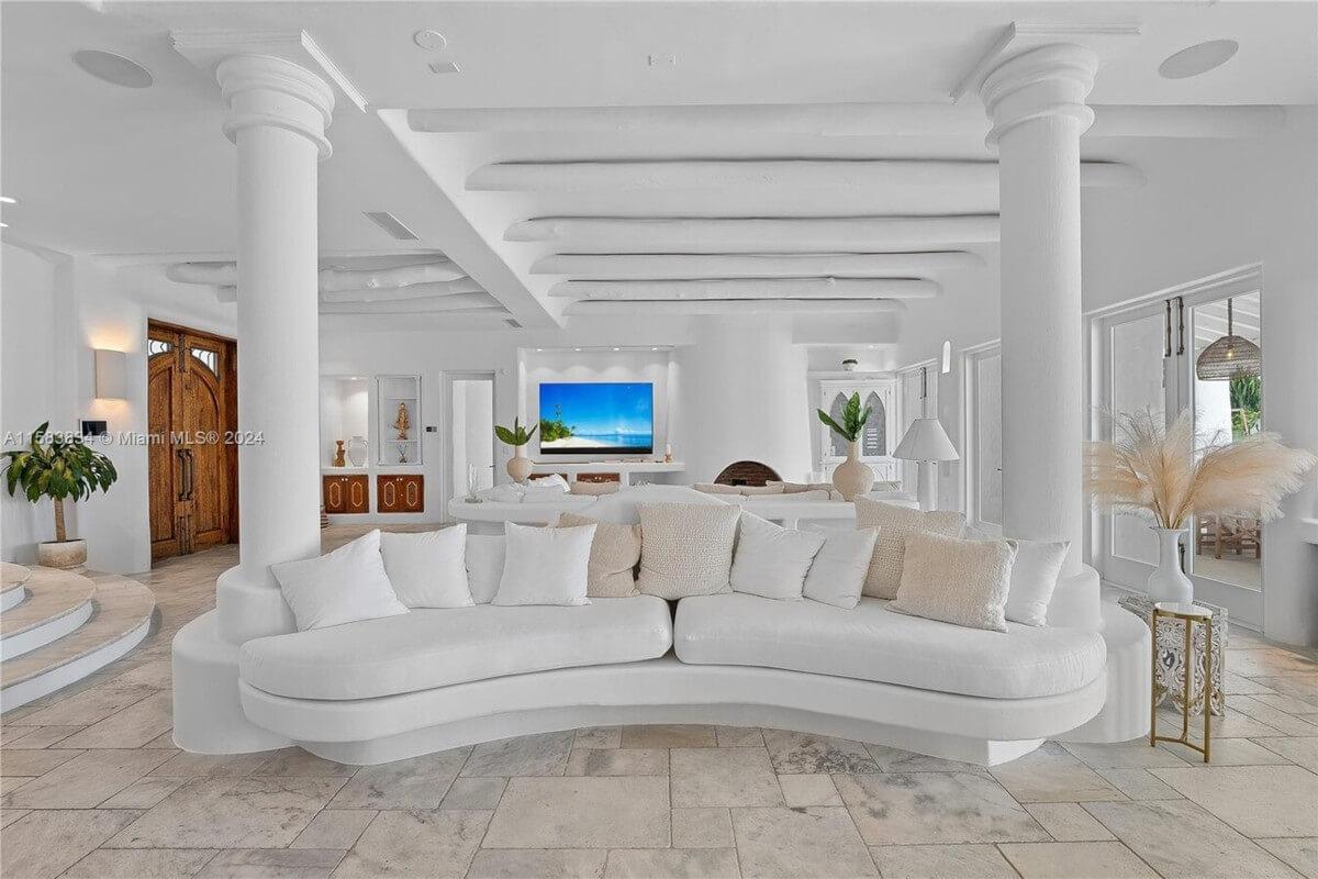 The all-white interior at 24 South Hibiscus Drive gives the home a beachy feel.