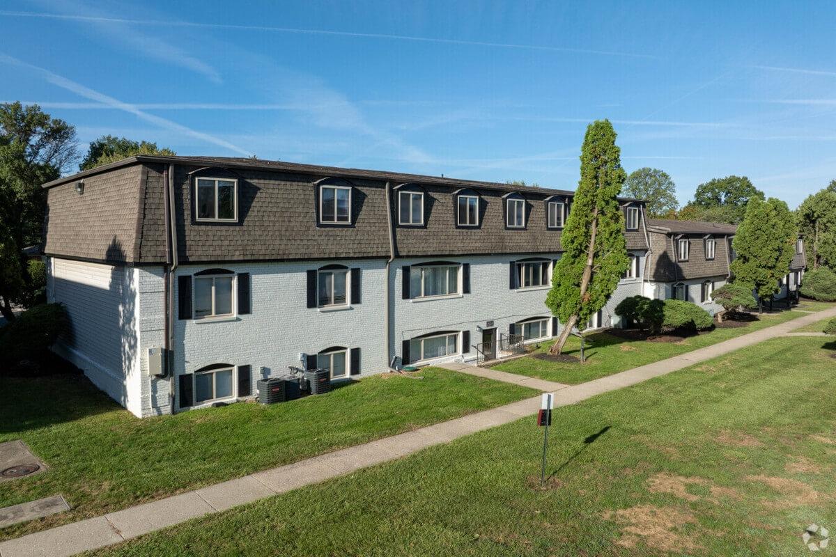 Residents at The Sterling see bright green grass and lush trees from their windows.