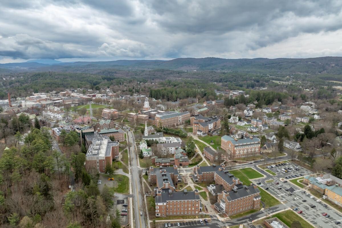 An aerial view of Hanover, New Hampshire, shows the Dartmouth College campus with Baker-Berry Library in the center.