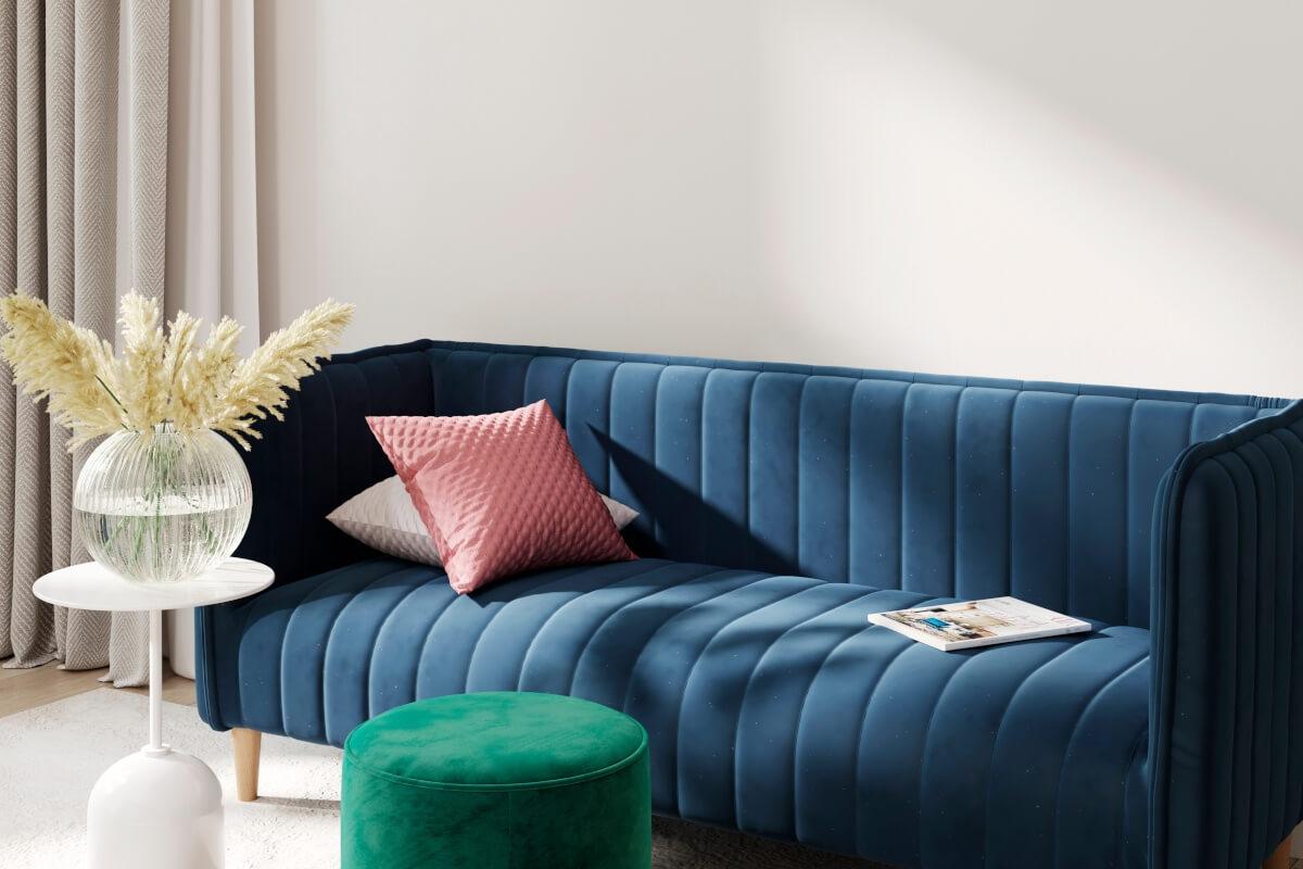 Jewel tones like sapphire blue and emerald green add an element of intrigue to a space and pair well with warm neutrals.