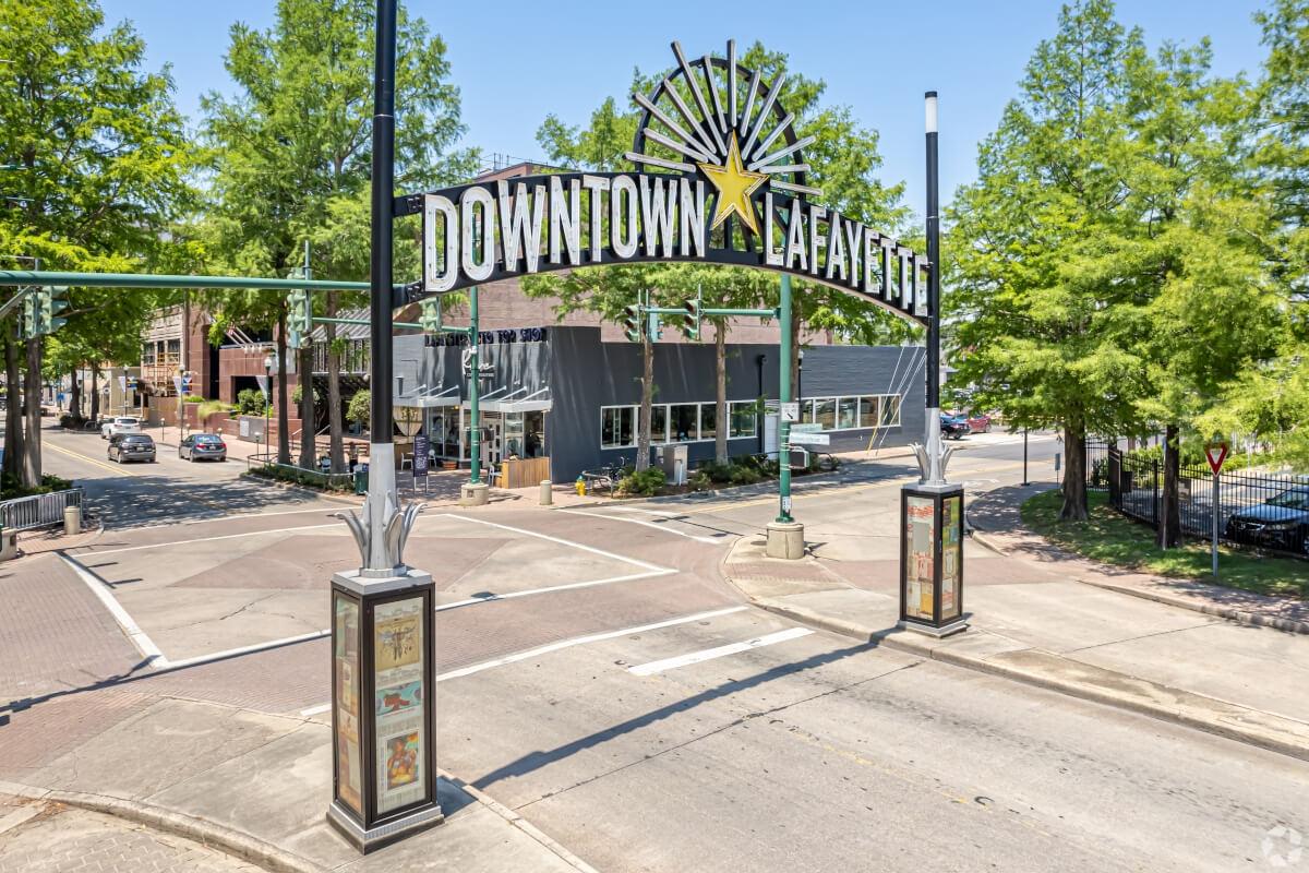 An archway towers over Downtown Lafayette.