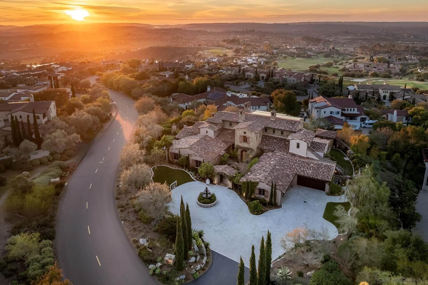 The sun sets over 8076 Entrada De Luz East.