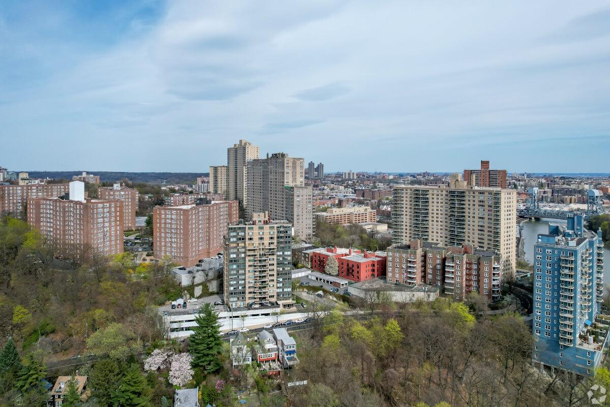 High-rise apartment buildings in Spuyten Duyvil overlook the neighborhood’s greenery.