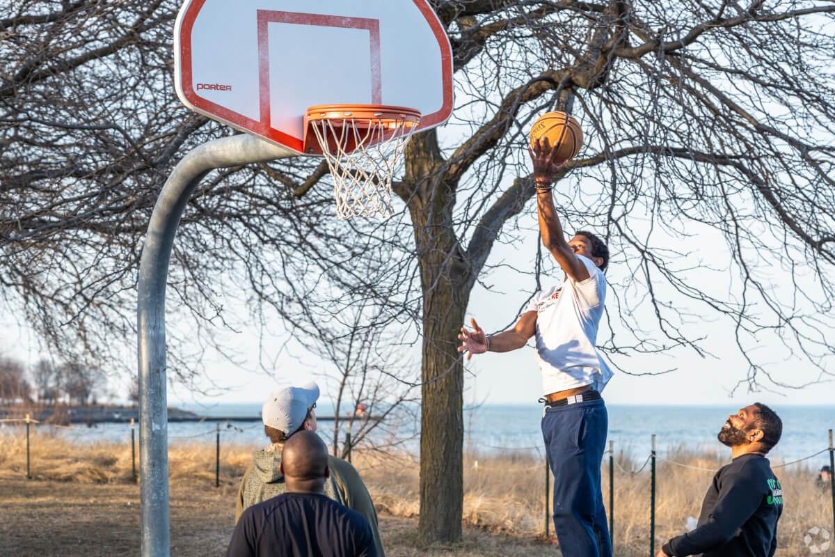 City goers play basketball in Andersonville.