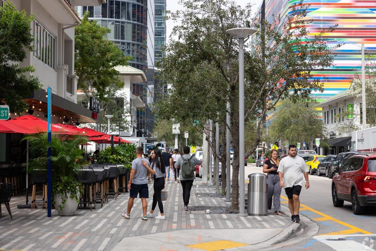 People walk down pedestrian-friendly streets in Brickell.