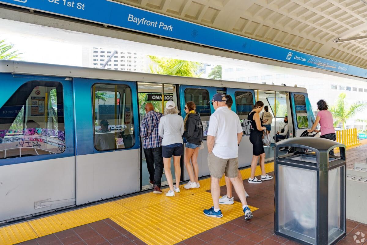 Miami residents ride the Metro Mover.