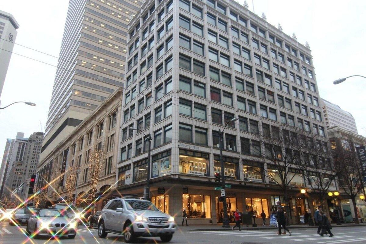 Sixth & Pine Building in downtown Seattle, a historic commercial-residential structure near major retail and business hubs.