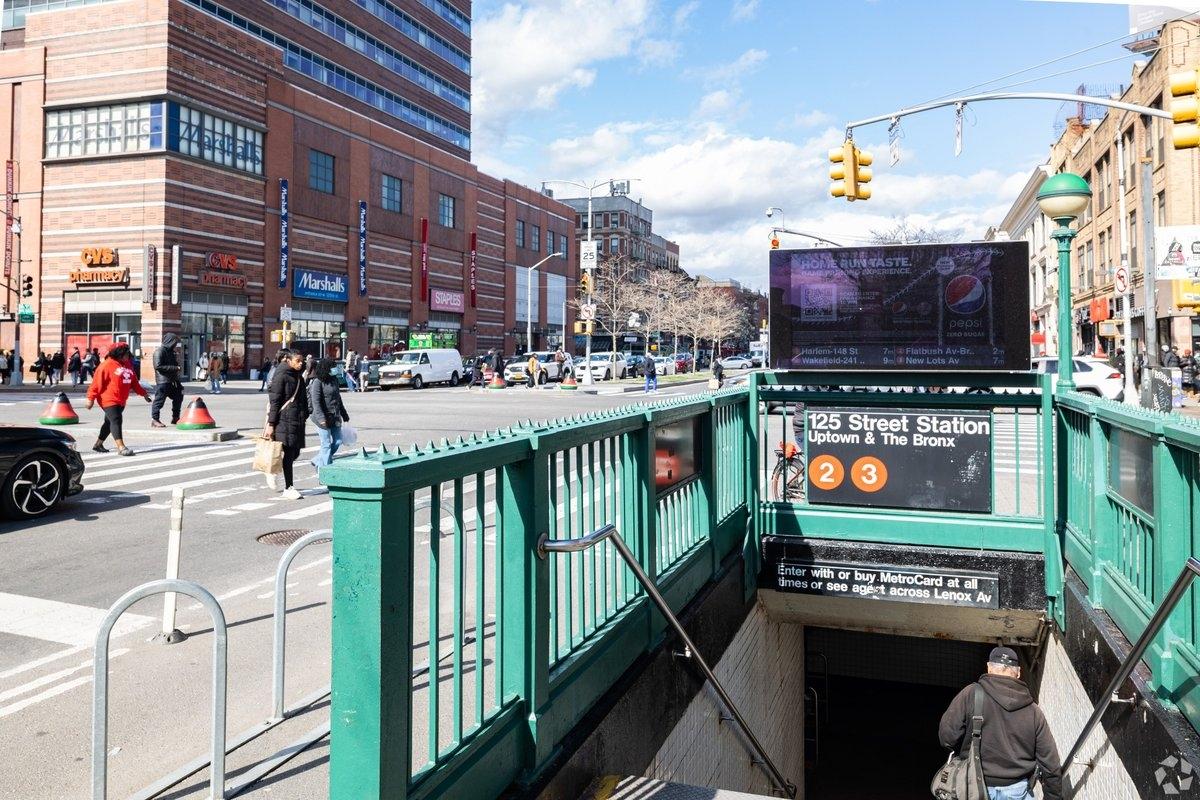 Bustling main street in Central Harlem