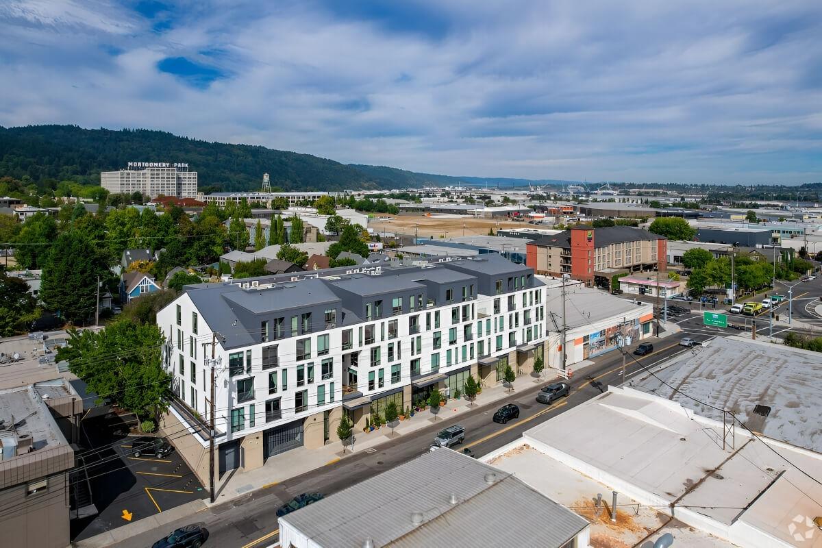 Forest Park rises behind the Fitz apartment community.