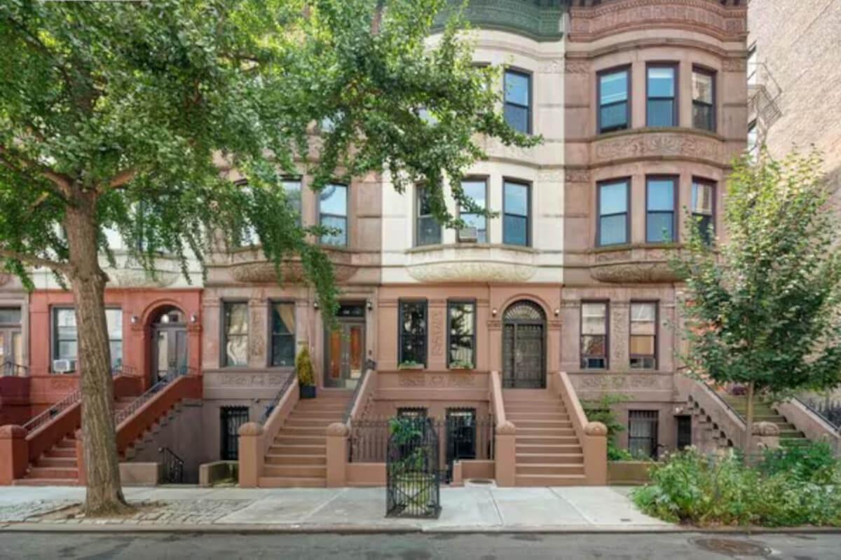A row of brownstones on 139th Street in Manhattan.