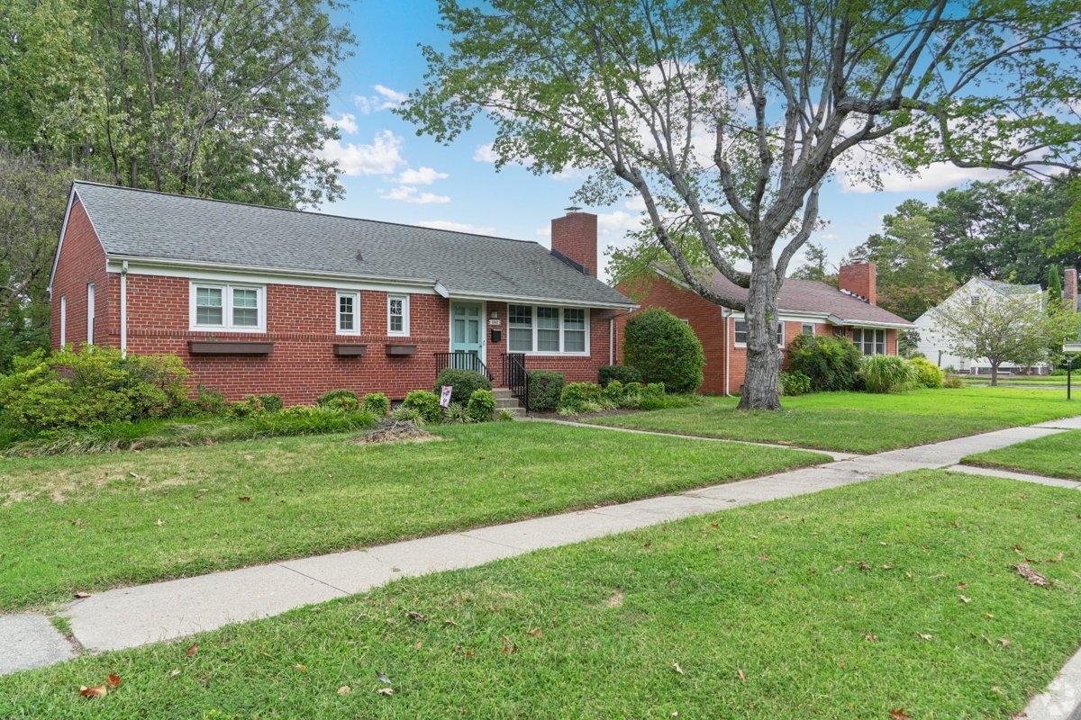 Two small red brick homes in the Rosedale neighborhood in Richmond, VA