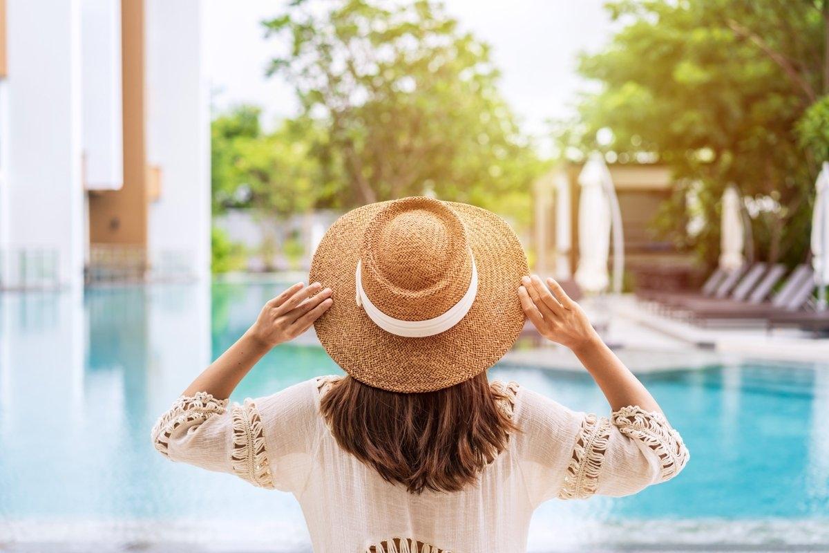 A millionaire enjoying a pool and sunshine