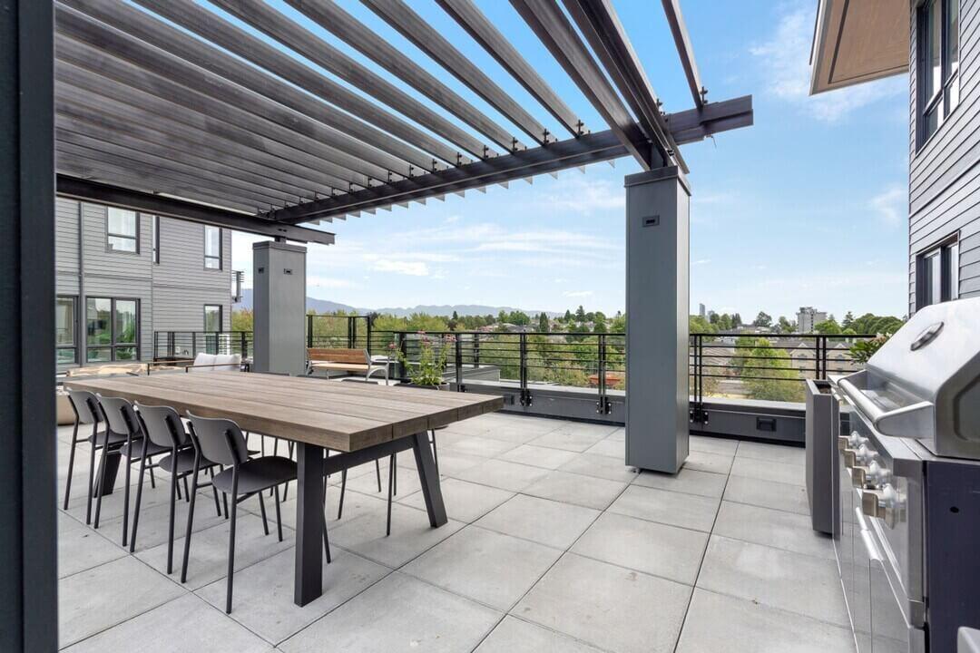 A rooftop terrace at 2450 Garden Drive overlooks Vancouver.