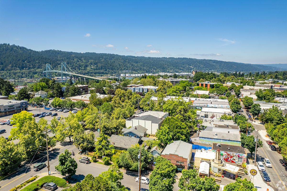 St. Johns is a tree-filled neighborhood with the St. Johns Bridge leading to downtown.