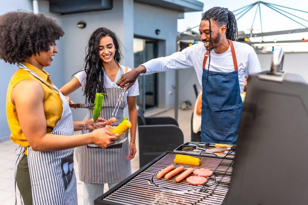 Apartment residents enjoy a building-wide barbecue.