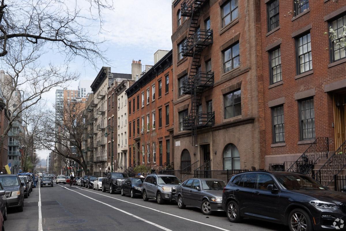 Cars parked on a street in Hell's Kitchen.