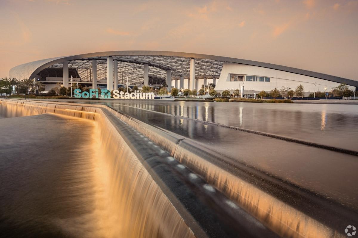 SoFi Stadium in Inglewood, CA, at sunset.