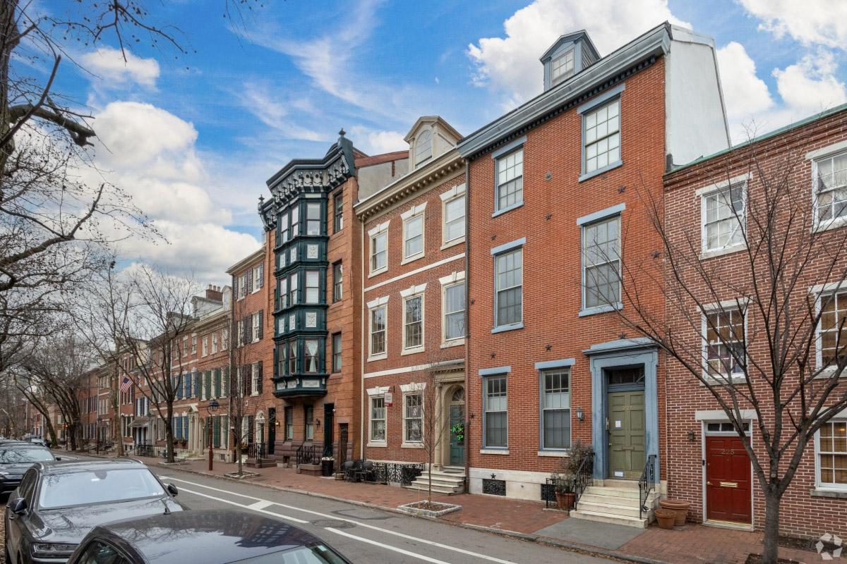 Historic brick rowhouses line a street in Old City.