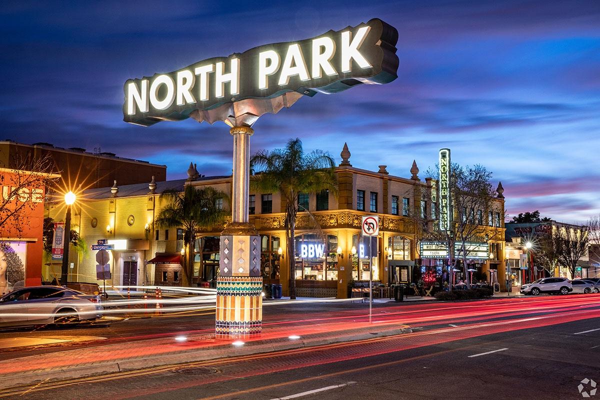 North Park's sign lights up during the night.