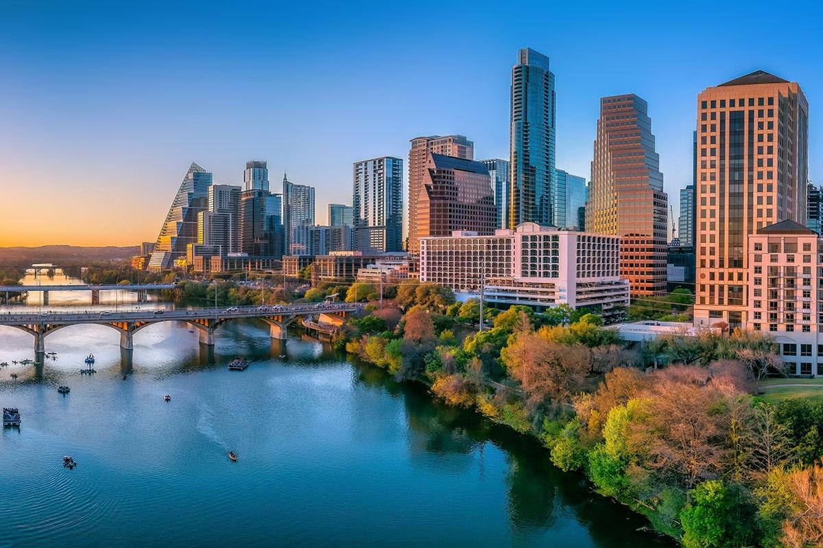 Downtown Austin rises along the Colorado River and its parks.