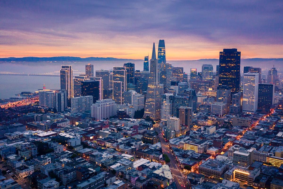 San Francisco's skyline has many iconic buildings that light up during the evening.