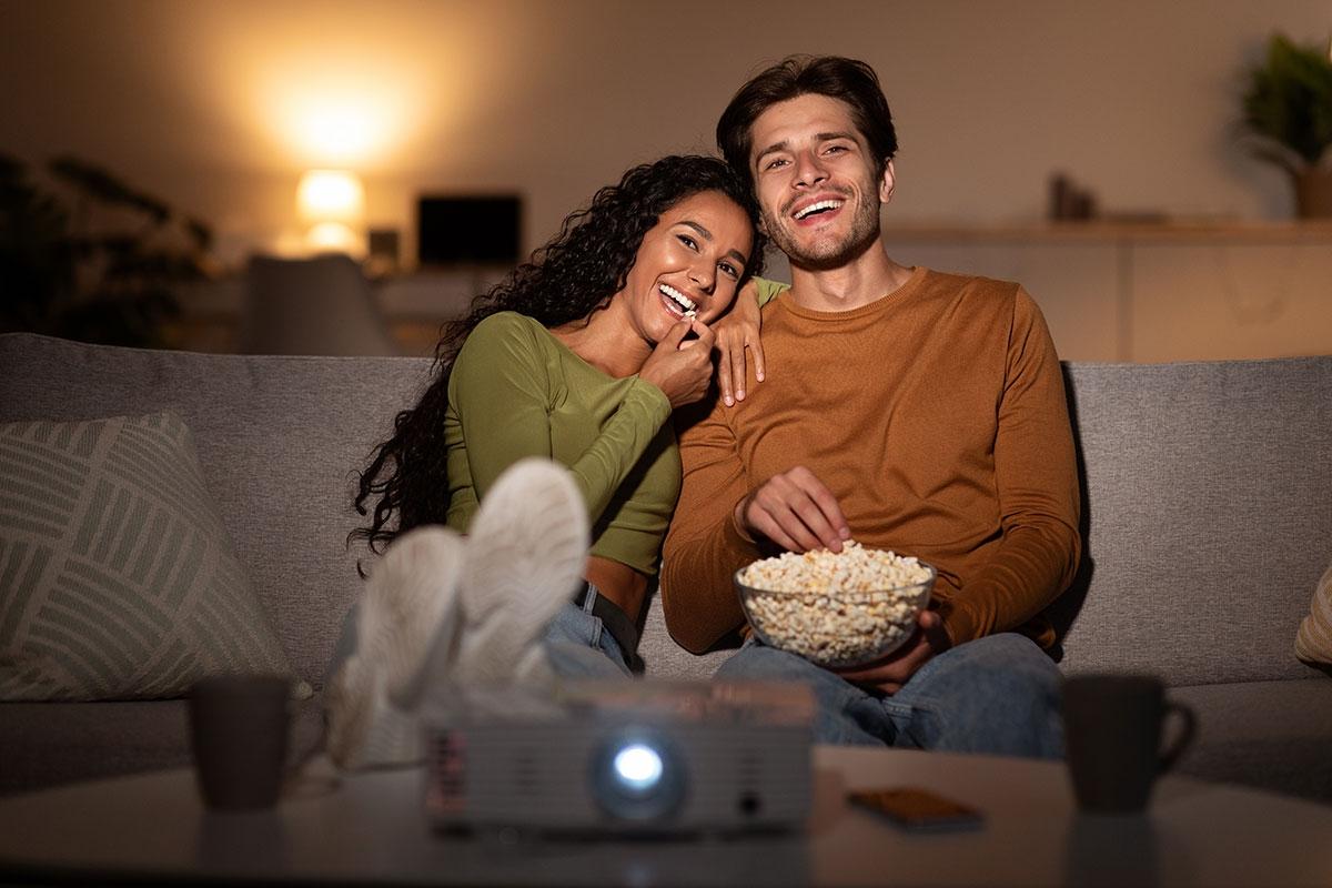 Renters watching movie in apartment 