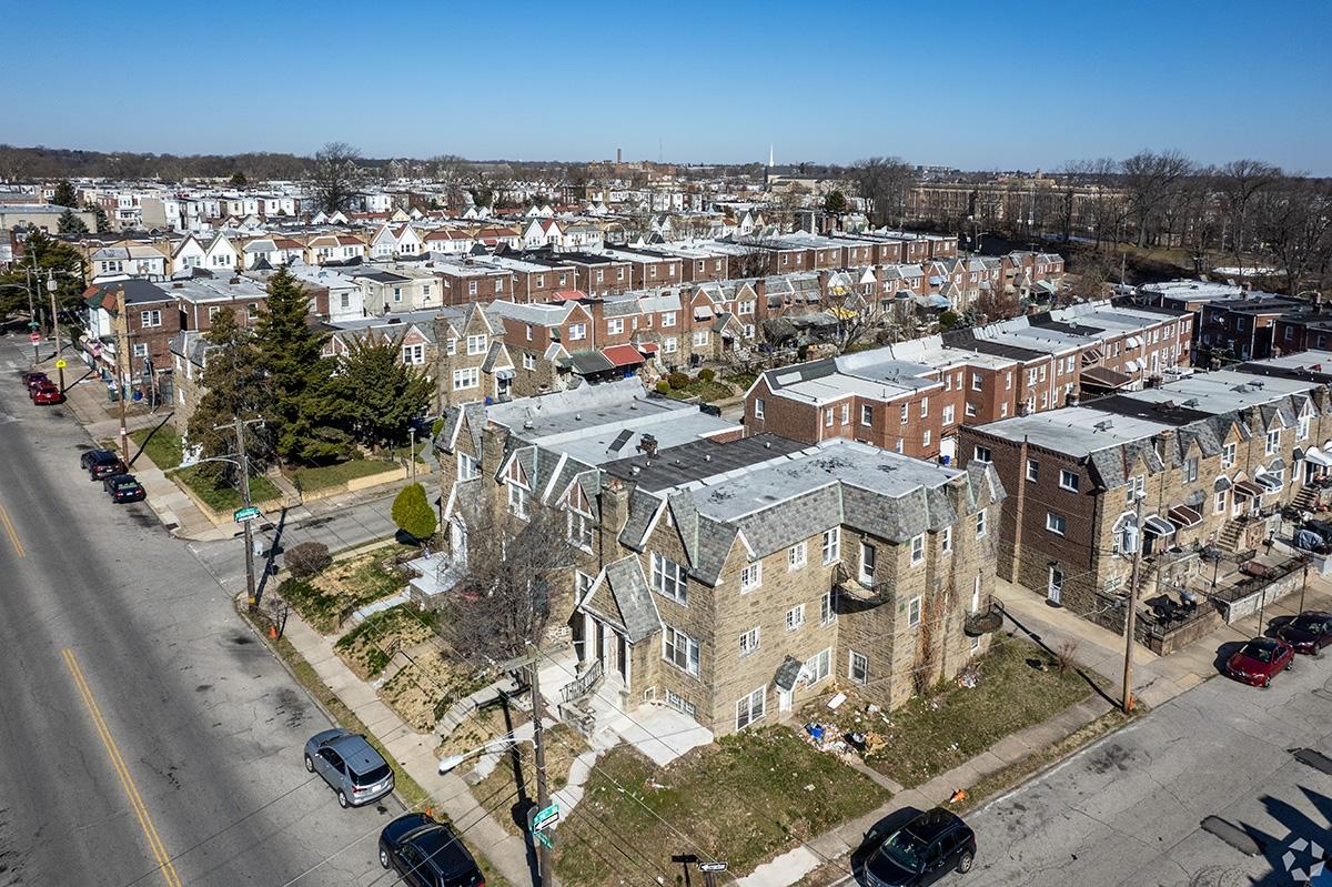 An aerial view of the Logan-Ogontz-Fern Rock neighborhood shows brick and stone rowhomes.