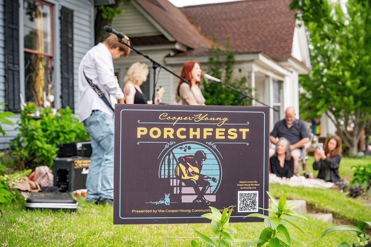 A local band performs on a front porch for Cooper-Young Porchfest.