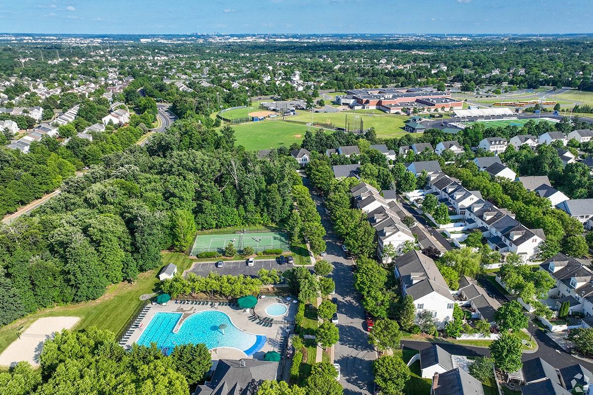 Neighborhoods and schools in Ashburn, VA, are surrounded by trees.