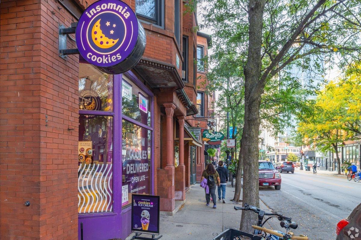 A main street in Lincoln Park with shops and eateries