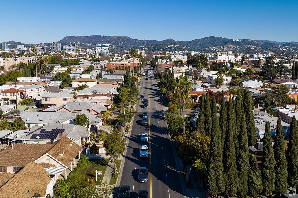 Homes and apartment communities sit on tree-lined roads in Lincoln.