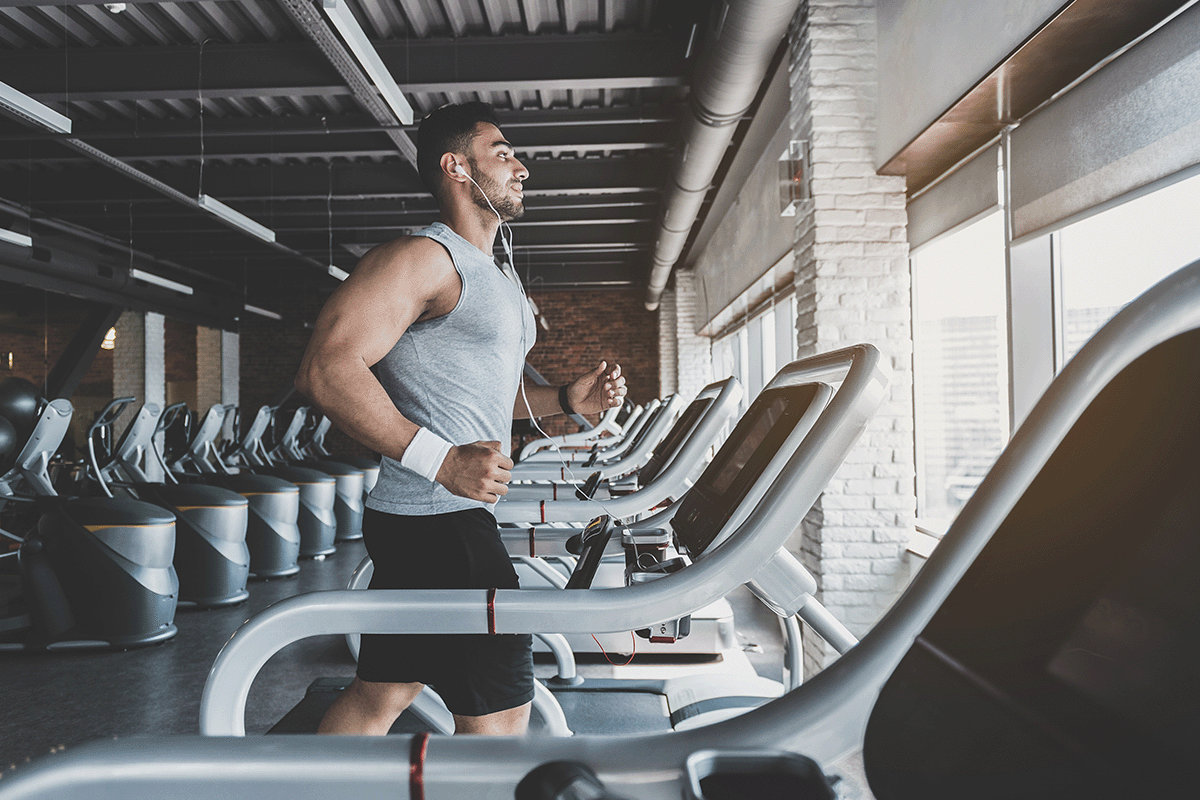 Man working out at apartment gym